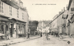 FRANCE - Lapalisse - Vue Sur La Rue Nationale - Animé - Carte Postale Ancienne - Lapalisse