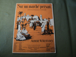 PARTITION SUR UN MARCHE PERSAN. REEDITION DE 1934. ALBERT W. KETELBEY 1ER PLAT ILLUSTRE PAR MAC. EN ALLEMAND ET FRANCAIS - Altri & Non Classificati