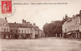- 27 - BRETEUIL (Eure) - Place Laffitte (côté Nord) Et Rue Paul D'Urclé - Scan Verso - - Acquigny