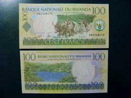 UNC Banknote Rwanda 2003 100 Francs Oxen And Farmer Plowing Mountains P-29a - Rwanda