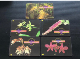 Singapore Telecom Singtel GPT Phonecard, Native Orchids Of Singapore, Set Of 5 Used Cards Including One $50 Card - Singapur