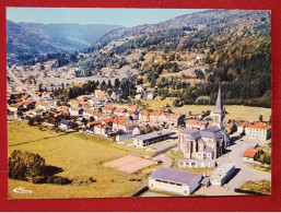 CPM -  Saulxures Sur Moselotte -(Vosges) - Vue Générale Aérienne - Le Centre Et Les Amias - Saulxures Sur Moselotte