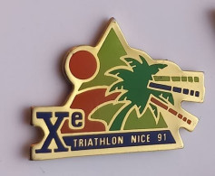 PO78 Pin's 10 ème X ème Triathlon De Nice 91 Natation Vélo Cyclisme Course à Pieds Palmier Achat Immédiat - Biathlon