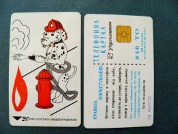 Phonecard Chip Cartoon Animals Dog Fire K234 10/97 30,000ex. 840 Units Prefix Nr. GD (in Cyrillic) UKRAINE - Oekraïne