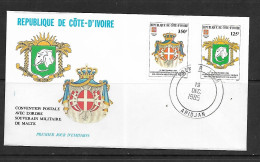 COTE D'IVOIRE 1985 FDC ARMOIRIES-CONVENTION POSTALE AVEC L'ORDRE DE MALTE  YVERT N°725/726 - Sobres