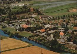 72406900 Greetsiel Zwillingsmuehlen Fliegeraufnahme Greetsiel - Krummhörn