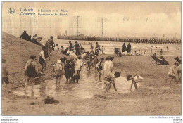 11paJ    BELGIQUE OOSTENDE L'ESTACADE ET LA PLAGE BAIGNEURS ENFANTS EN GROS PLAN - Oostende