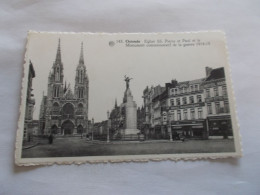 OSTENDE   ( BELGIQUE ) EGLISE SAINT PIERRE ET SAINT PAUL ET MONUMENT COMMEMORATIF GUERRE 1914/18  COMMERCES - Oostende