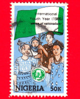 NIGERIA  - Usato - 1985 - Anno Internazionale Dei Giovani - Gioventù Con Bandiera Nazionale - 50 - Nigeria (1961-...)