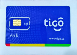 Democratic Republic Of The Congo Tigo Gsm  Original  Chip Sim Phone Card - Collections