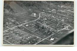 PAPOUASIE - Vue Aérienne D'un Village - Copyright Jaap Zindler - Papoea-Nieuw-Guinea