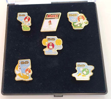 [-15%] Boîtier De 6 Pins Jeux Olympiques - Albert Ville 1992 Mars Et M&Ms - Lotes