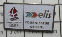 713L Pin's Pins / Beau Et Rare / JEUX OLYMPIQUES / ALBERTVILLE 1992 ELIS FOURNISSEUR OFFICIEL - Jeux Olympiques