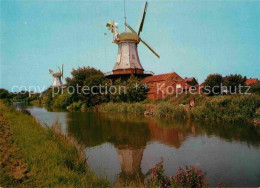 72896473 Greetsiel Doppelwindmuehlen Greetsiel - Krummhoern