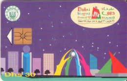 EMIRATOS ARABES UNIDOS. UAE-C-036A. 1997 Dubai Shopping Festival, Skyline (C/N "9711"). (082) - Emirats Arabes Unis