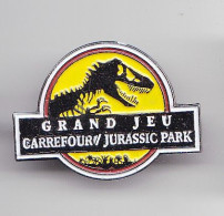 Pin's Grand Jeu Carrefour Jurassic Park Dinosaure Réf 6246 - Games