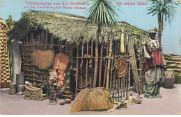 Ghana - Gold Coast - Fetischpriester Von Der Godküste Vor Seiner Hütte Aus Der Ausstellung Der Basler Mission - Ghana - Gold Coast