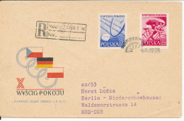Poland Registered FDC 4-5-1957 CYCLING With Cachet Uprated On The Backside And Sent To Germany - FDC