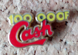 Pin's Cash 10 000 F Signé Decat Paris - Giochi