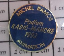 718A Pin's Pins / Beau Et Rare / MEDIAS / RADIO-MANCHE 1992 MICHEL RAMOS PODIUM ANIMATION - Médias
