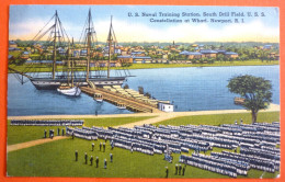 USA - NEWPORT, U.S. NAVAL TRAINING STATION. SOUTH DRILL FIELD U.S.S. CONSTELLATION AT WHARF. - Newport