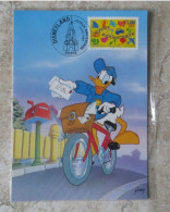 CPM Disneyland - Donald à Vélo En Facteur Distribuant Le Courrier - Carte Maximum Disneyland Sous Blister 12/04/1997 - Disneyland