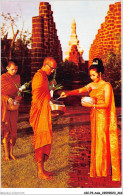 AICP3-ASIE-0386 - A Thai - Young Girl Is Making Merit By Giving Foods To The Thai Priest - Tailandia