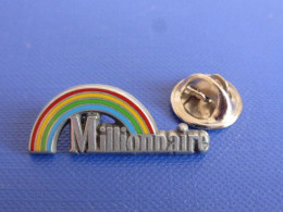 Pin's Brut Arthus Bertrand Millionaire - Jeu à Gratter FDJ Française Des Jeux - Arc En Ciel - Pin's Non Doré (AA10) - Arthus Bertrand