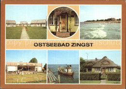 72458848 Zingst Ostseebad Bungalowdorf Bemalte Tuer Strand Kaufhalle Fischerboot - Zingst