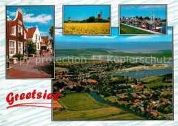 73615579 Greetsiel Friesenhaeuser Windmuehle Hafen Fliegeraufnahme Greetsiel - Krummhoern