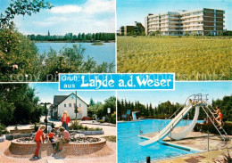 73666698 Lahde Weser Panorama Wohnblock Brunnen Schwimmbad Lahde Weser - Petershagen