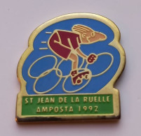 A355 Pin's Vélo Cyclisme ST Saint Jean De La Ruelle AMPOSTA Loiret Anneaux Jeux Olympiques JO Achat Immédiat - Jeux Olympiques