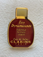 Pin's Vintage épinglette Publicitaire CLARINS PARIS - Perfumes