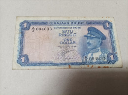 Billete Brunei, 1 Ringgit, Año 1967, Nº Bajisimo 004033, Serie A - Brunei