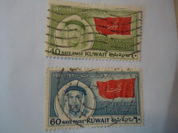 KUWAIT  USED  2 STAMPS   ANNIVERSARIES FLAGS  WITH POSTMARK - Kuwait