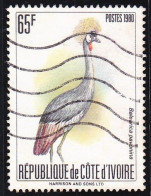 Timbre-poste Dentelé Oblitéré - Oiseaux Et échassiers Grue Couronnée (Balearica Pavonina) - N° 565C (Yvert) - RCI 1980 - Costa D'Avorio (1960-...)