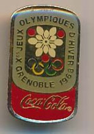 Pin's 21 X 32 Mm  X° Jeux Olympiques D'Hiver De Grenoble 1968  COCA COLA Les 3 Roses Rouges - Juegos Olímpicos