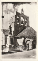 SAINT-ALBAN. - Monument Aux Morts Et Le Clocher . CPSM 9X14 - Saint Alban Sur Limagnole