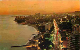 Etats Unis - Waikiki - Evening View Of Kalakaua Avenue - CPM - Voir Scans Recto-Verso - Autres & Non Classés