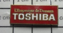 116c Pin's Pins / Beau Et Rare / MARQUES / TOSHIBA L'EMPREINTE DE DEMAIN - Markennamen