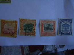 ECUADOR USED   4 STAMPS  MONUMENTS LADSCAPES 1930 - Equateur