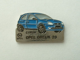 PIN'S OPEL CORSA BLEUE - DREUX - Opel