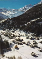 SUISSE .CPSM. SAAS-GRUND. VUE GENERALE AERIENNE EN HIVER. ANNEE 1977 + TIMBRE + TEXTE - Saas-Grund