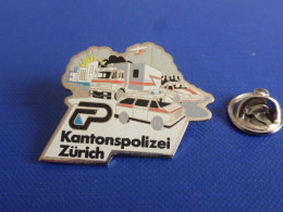 Pin's Police Suisse Zurich - Kantonspolizei - Policier Voiture Camion Hélicoptère Intervention Explosion (KB19) - Politie