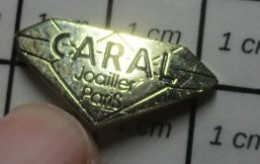 216A Pin's Pins / Beau Et Rare / MARQUES / CARAL JOAILLIER PARIS - Markennamen