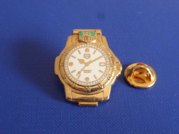 Pin's Montre Tag Heuer - Arthus Bertrand (AA31) - Arthus Bertrand