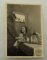 Two Little Girls Are Playing With A Doll - Personnes Anonymes