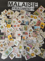 MALAISIE VRAC 28 G SUR FRAGMENTS, MODERNES, GRANDS - Alla Rinfusa (max 999 Francobolli)