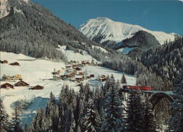 136995 - Langwies - Schweiz - Winterbild Mit Zug - Autres & Non Classés