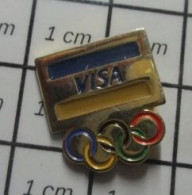 712D Pin's Pins / Beau Et Rare / JEUX OLYMPIQUES / CARTE VISA ATHLETISME BARCELONA 92 - Giochi Olimpici